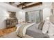 Bright main bedroom with sitting area and access to the outdoor patio at 150 Trinity Farm Dr, Canton, GA 30115