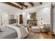 Relaxing main bedroom with neutral color palette and shiplap walls at 150 Trinity Farm Dr, Canton, GA 30115