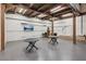 Recreation room with high ceilings, exposed wooden beams, and casual seating area for entertainment at 150 Trinity Farm Dr, Canton, GA 30115