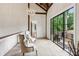 Bright sitting area with large windows, elegant chairs, and a view of the outdoors at 150 Trinity Farm Dr, Canton, GA 30115
