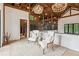 Cozy sitting area with elegant seating, chandelier, and natural light at 150 Trinity Farm Dr, Canton, GA 30115