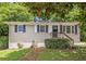 Charming single-story home with brick exterior, manicured lawn, and inviting front entrance at 1829 Goddard Se St, Atlanta, GA 30315