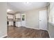 Eat-in kitchen featuring stainless steel appliances, granite countertops and white cabinetry at 1829 Goddard Se St, Atlanta, GA 30315