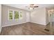 Bright living room featuring hardwood floors, neutral walls, and ample natural light at 1829 Goddard Se St, Atlanta, GA 30315