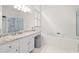 Sun-filled primary bath with double sinks, soaking tub and glass shower at 1241 Newbridge Trce, Brookhaven, GA 30319