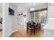 Eat in breakfast area featuring hardwood floors, large windows and modern lighting at 1241 Newbridge Trce, Brookhaven, GA 30319