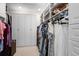 Custom closet with cabinets and shelves for storage at 1241 Newbridge Trce, Brookhaven, GA 30319