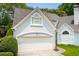 Charming home exterior with a two car garage at 1241 Newbridge Trce, Brookhaven, GA 30319
