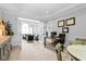 Spacious home office with french doors, and natural light creates a productive workspace at 1241 Newbridge Trce, Brookhaven, GA 30319