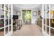 Home office with natural light, neutral colors, and ample workspace at 1241 Newbridge Trce, Brookhaven, GA 30319