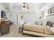 Bright main bedroom with plush carpet, crown molding and neutral walls and ceilings at 1241 Newbridge Trce, Brookhaven, GA 30319
