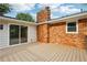 Charming back porch with access to the home via a sliding glass door at 1869 Hebron Hills Dr, Tucker, GA 30084