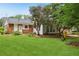 Well-maintained backyard with vibrant green grass, perfect for Gathering fun at 1869 Hebron Hills Dr, Tucker, GA 30084