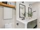 Stylish bathroom with double vanity, framed mirrors, and decorative accents at 1869 Hebron Hills Dr, Tucker, GA 30084