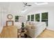 Bright living room with vaulted ceilings, skylights, large windows, and modern decor at 1869 Hebron Hills Dr, Tucker, GA 30084