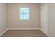 Bedroom with neutral carpet and a window offering natural light at 2247 Cherokee Valley Dr, Lithonia, GA 30058