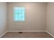 Bedroom with neutral carpet and a window for ample light at 2247 Cherokee Valley Dr, Lithonia, GA 30058