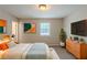 Relaxing bedroom featuring modern decor, stylish furniture, and a tranquil ambiance for restful nights at 2247 Cherokee Valley Dr, Lithonia, GA 30058