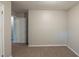 A simple bedroom with fresh paint, carpet, and a closet at 2247 Cherokee Valley Dr, Lithonia, GA 30058