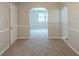 Hallway featuring neutral walls and carpeting at 2247 Cherokee Valley Dr, Lithonia, GA 30058