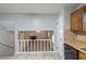 View from kitchen features a living room with fireplace at 2247 Cherokee Valley Dr, Lithonia, GA 30058