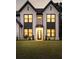 Charming new construction home with brick facade, gabled roof, and manicured lawn at 3735 Tamiami Trl, Cumming, GA 30041