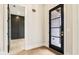 Bright foyer featuring hardwood floors and modern finishes at 3735 Tamiami Trl, Cumming, GA 30041