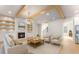Stylish living room featuring hardwood floors, fireplace, and comfortable seating at 3735 Tamiami Trl, Cumming, GA 30041
