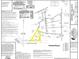 Survey map of the property at T.W. Henderson Road with plot boundaries and dimensions at 3735 Tamiami Trl, Cumming, GA 30041
