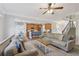 Open-concept living room boasts seamless flow, neutral tones, and comfortable furnishings at 6160 Oriole Ln, Cumming, GA 30028