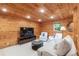 Spacious, fully-finished basement with wood paneling and ample entertaining space at 6960 Hunters Branch Dr, Atlanta, GA 30328