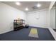 Clean basement gym with open floor plan, carpet and neutral walls at 6960 Hunters Branch Dr, Atlanta, GA 30328