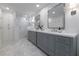 Elegant bathroom with double vanity, marble floors, and glass-enclosed shower at 6960 Hunters Branch Dr, Atlanta, GA 30328