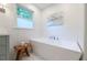 Bright bathroom featuring a modern soaking tub and stylish finishes at 6960 Hunters Branch Dr, Atlanta, GA 30328