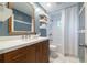 Stylish bathroom with a modern vanity, ample storage, and a tub-shower combination at 6960 Hunters Branch Dr, Atlanta, GA 30328