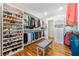 Spacious walk-in closet with custom shelving, hanging rods, and seating at 6960 Hunters Branch Dr, Atlanta, GA 30328
