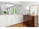 Bright butler's pantry with white cabinets, sleek countertops, and a sink at 6960 Hunters Branch Dr, Atlanta, GA 30328