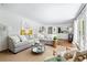 Spacious living room with a comfortable sectional sofa and stylish decor at 6960 Hunters Branch Dr, Atlanta, GA 30328
