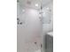 Modern tiled shower with glass door at 6960 Hunters Branch Dr, Atlanta, GA 30328