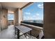 Cozy balcony with furniture and a panoramic city view at 75 14Th Ne St # 3820, Atlanta, GA 30309
