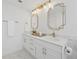 Bright bathroom with double vanity, modern fixtures, and stylish mirrors at 75 14Th Ne St # 3820, Atlanta, GA 30309