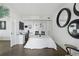 Stylish bedroom features a Murphy bed, work station, and unique decorative mirrors at 75 14Th Ne St # 3820, Atlanta, GA 30309