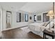 Spacious bedroom with large windows offering city views and hardwood flooring at 75 14Th Ne St # 3820, Atlanta, GA 30309