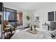 Cozy bedroom with a private balcony, elegant furniture, and refined decor at 75 14Th Ne St # 3820, Atlanta, GA 30309