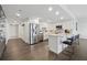 Modern kitchen with stainless steel appliances, marble countertops, and stylish breakfast bar at 75 14Th Ne St # 3820, Atlanta, GA 30309
