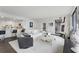 Bright living room features an open concept design, modern furnishings, and city views at 75 14Th Ne St # 3820, Atlanta, GA 30309