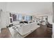 Spacious living area features modern decor, hardwood floors, and beautiful city views at 75 14Th Ne St # 3820, Atlanta, GA 30309