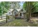 Charming home featuring unique stone accents, with a fenced yard at 835 Timber Lake Trl, Cumming, GA 30041