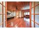 Spacious main bedroom features hardwood floors, ensuite bathroom, and sitting area at 835 Timber Lake Trl, Cumming, GA 30041