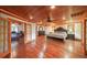 Spacious main bedroom features hardwood floors, ensuite bathroom, and attached office at 835 Timber Lake Trl, Cumming, GA 30041